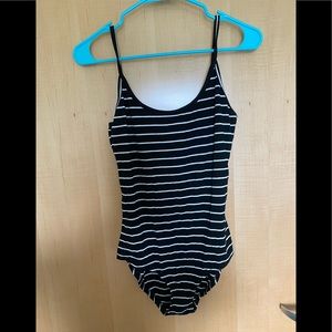 black and white striped body suit